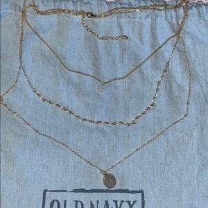 Three tiered gold necklace with quartz stones